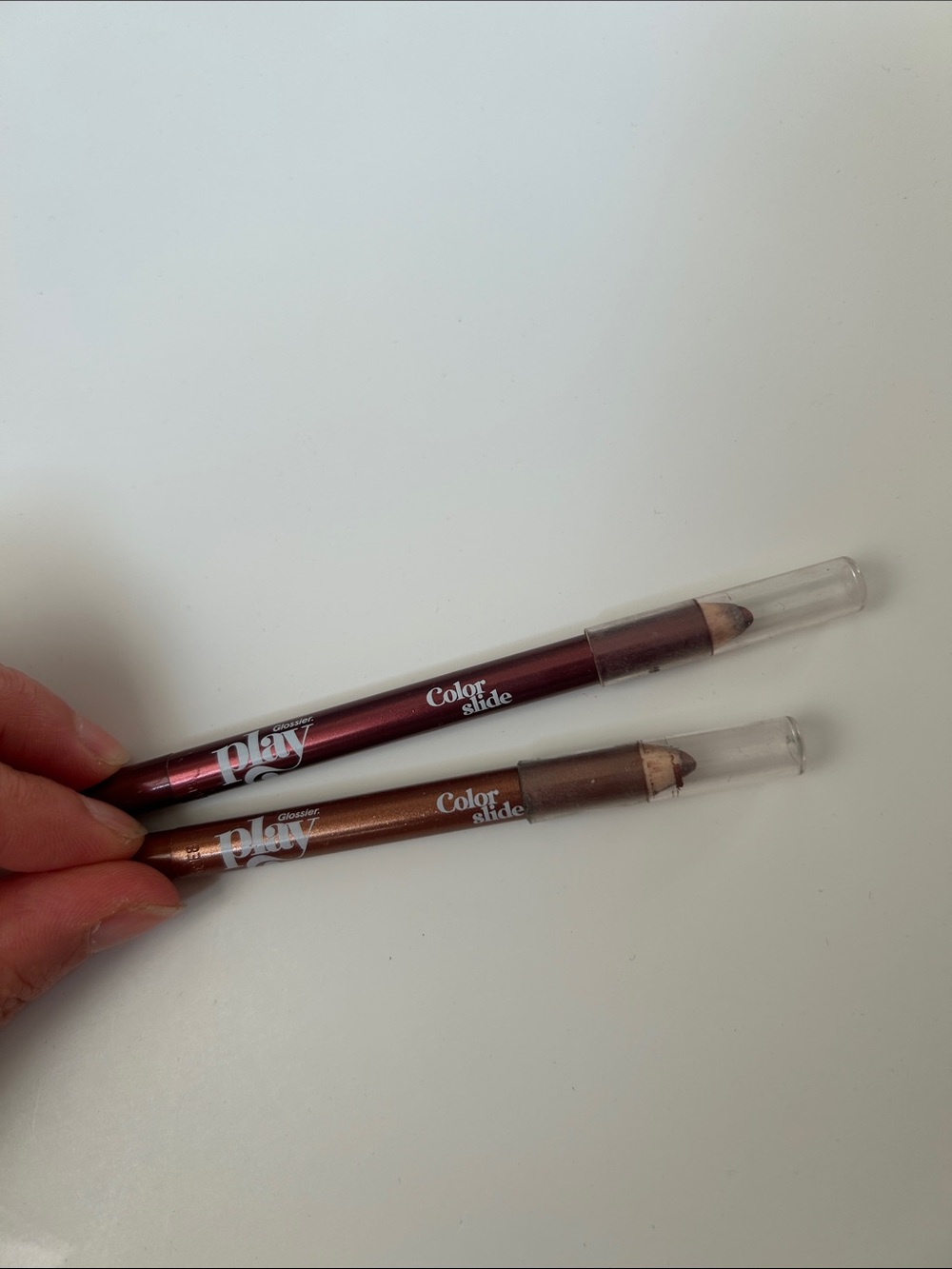 Glossier Play Color Slide Eyeliner Pretty Penny and Saturn Return discontinued